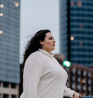 Female adult student from Cornerstone University standing outside in downtown Grand Rapids, Michigan