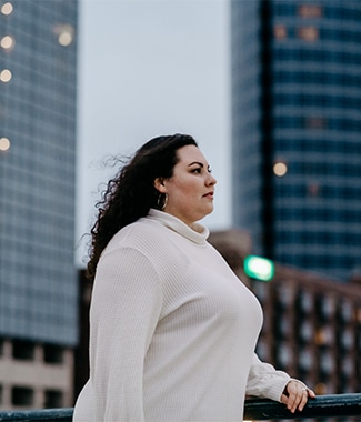 Female adult student from Cornerstone University standing outside in downtown Grand Rapids, Michigan