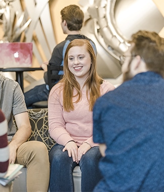 Group of undergraduate college students studying in the lobby of Christ Chapel at Cornerstone University