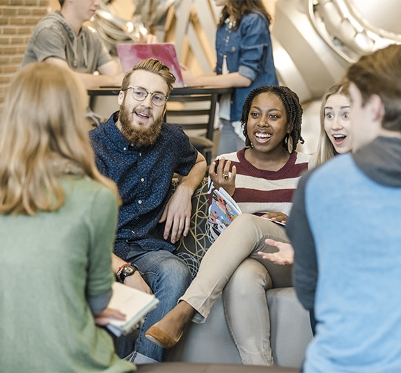 College students studying while sitting in a circle