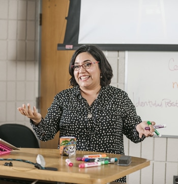Dr. Leticia Espinoza teaches in a lecture hall at Cornerstone University