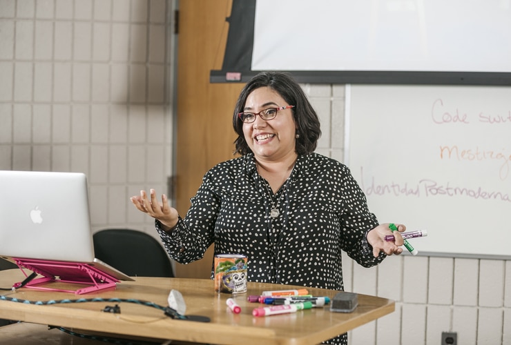 Dr. Leticia Espinoza teaches in a lecture hall at Cornerstone University