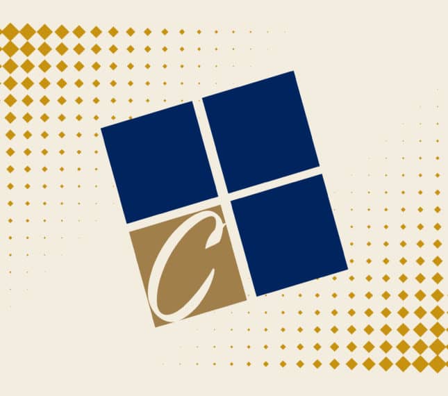 Icon from the CU logo which features three angled navy squares and one gold square with the letter C to form a cube