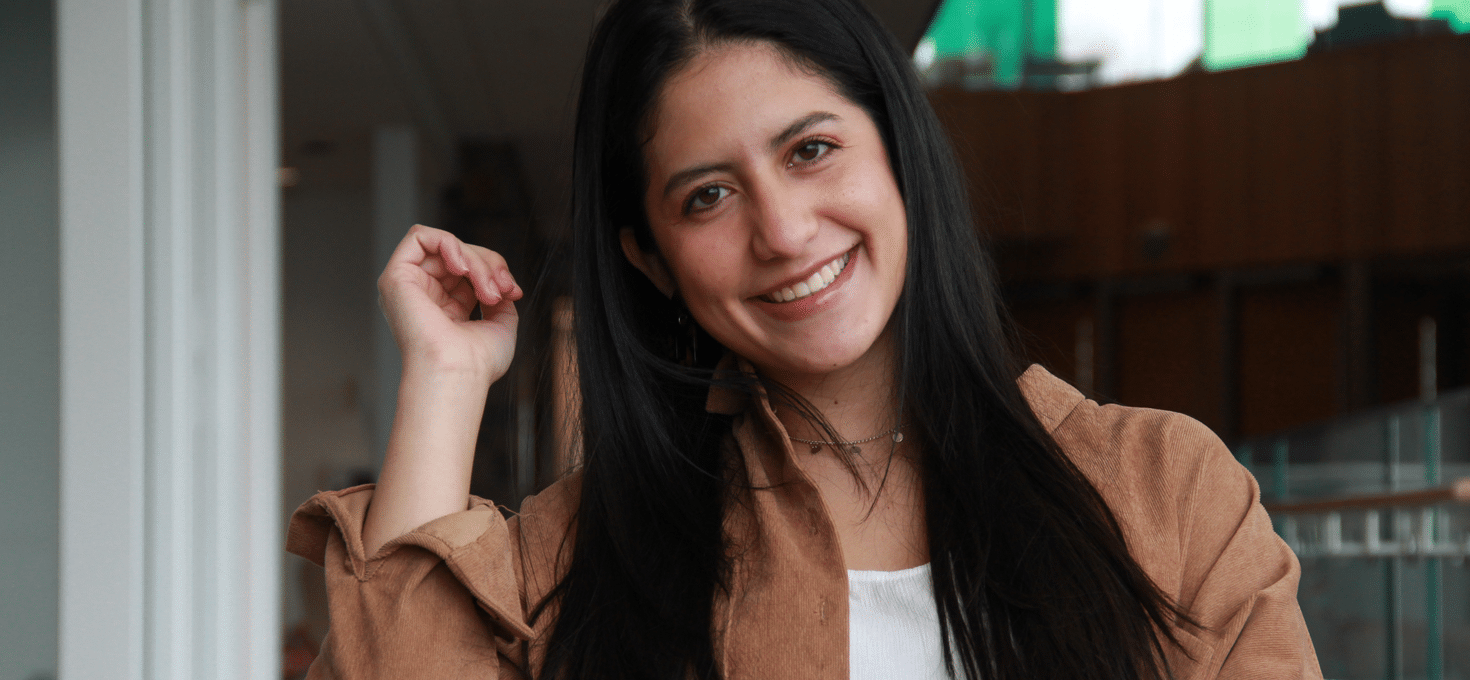 Juliana Bonilla in the lobby of the De Witt Center for Science and Technology at Cornerstone University