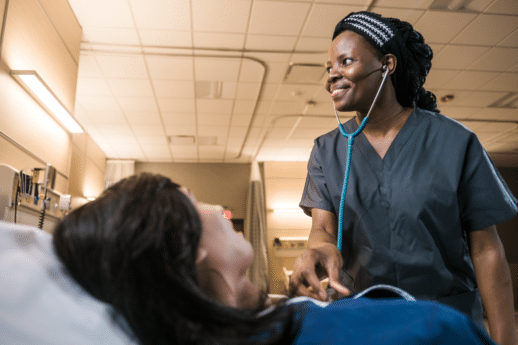 Female nursing student taking heart rate reading on a female mannequin in the De Witt Center for Nursing at Cornerstone University