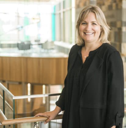 Heidi Cece standing in the atrium of the De Witt Center for Science and Technology