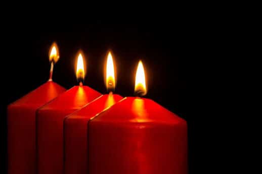 Four pillar candles lit for Advent