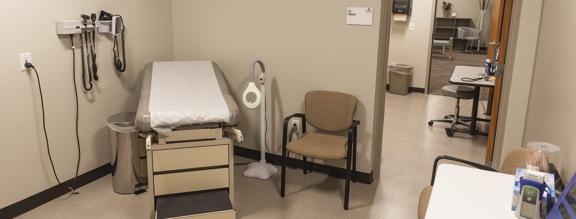 Medical office with an examining table, medical instruments and chair at Cornerstone University