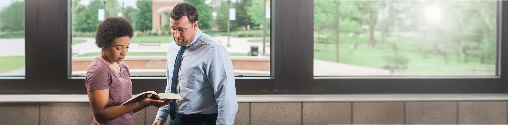 Dr. Jonathan Marko speaks with a B.S. in Biblical Studies student