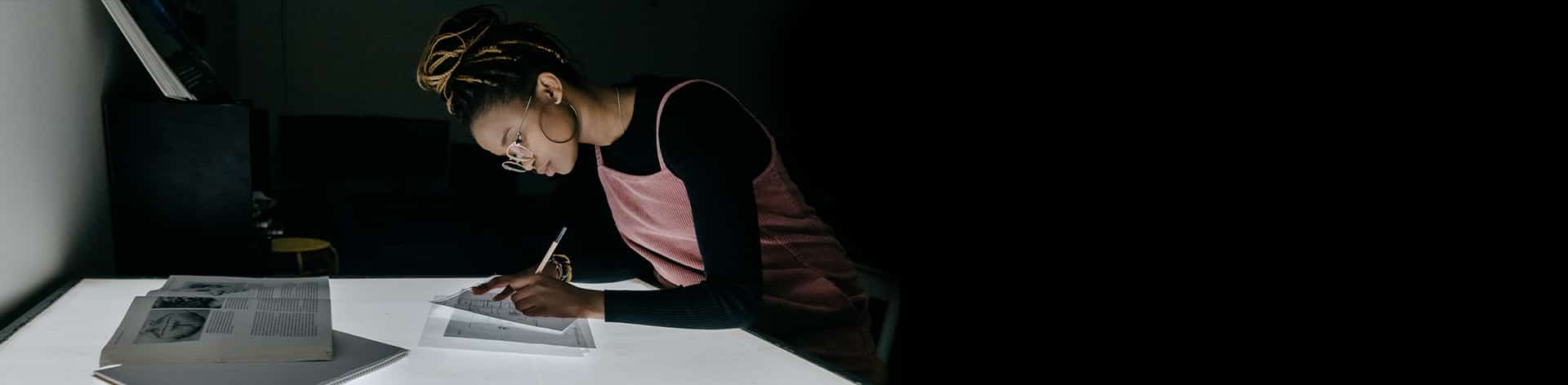 A student works on her graphic design skills at Cornerstone University