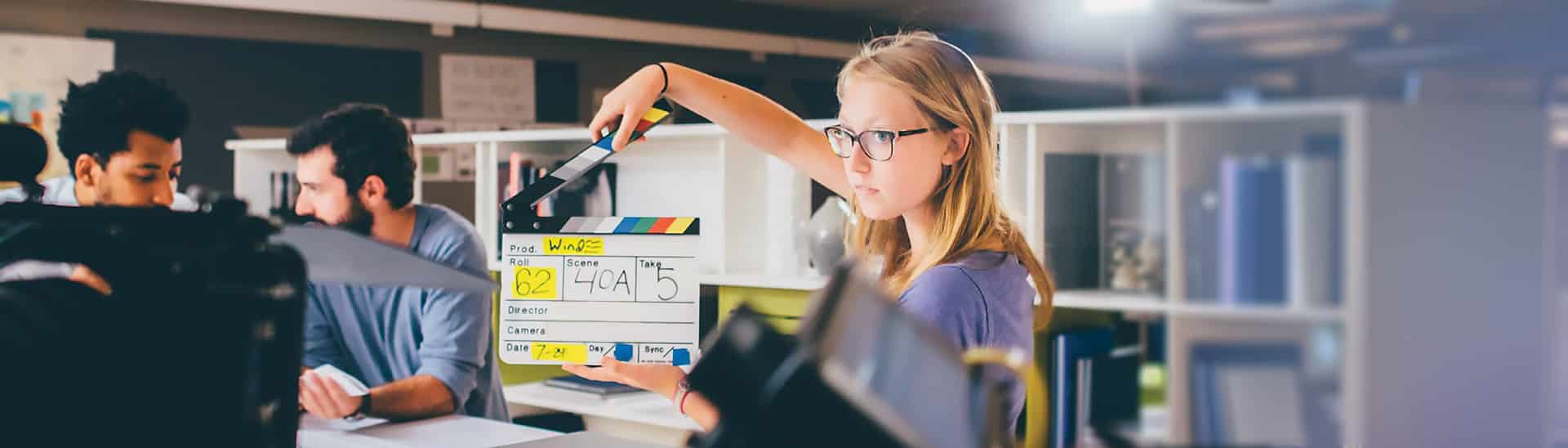 Media production student on set to enhance her skills