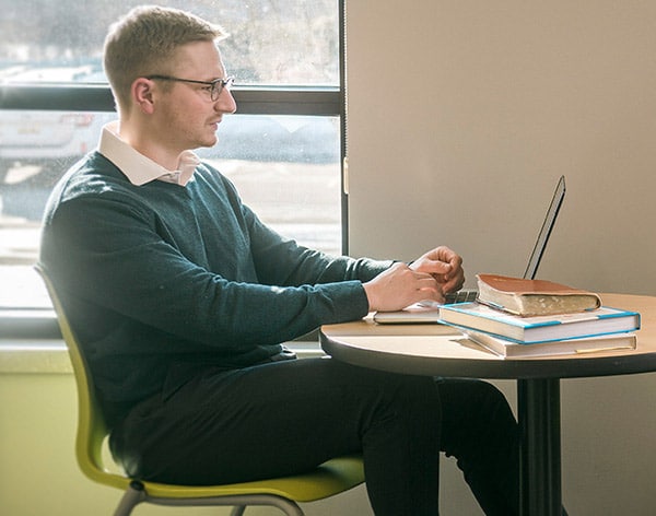 An accounting student engage in study at Cornerstone University