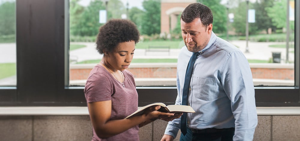 Dr. Jonathan Marko speaks with a B.S. in Biblical Studies student