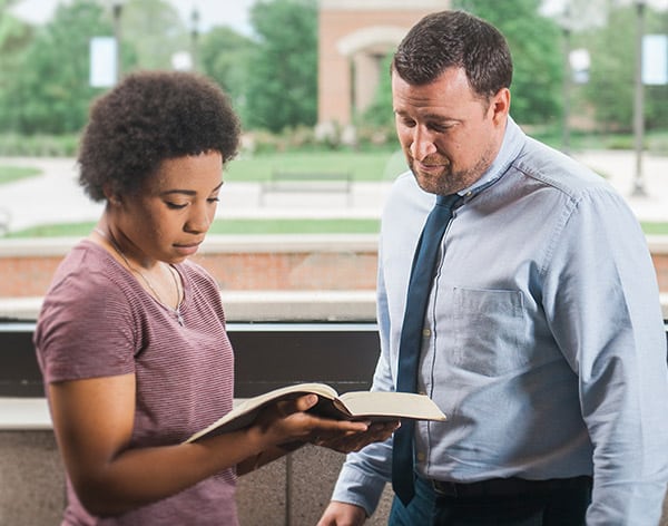 Dr. Jonathan Marko speaks with a B.S. in Biblical Studies student