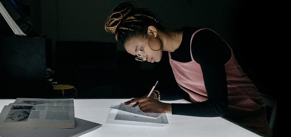 A student works on her graphic design skills at Cornerstone University