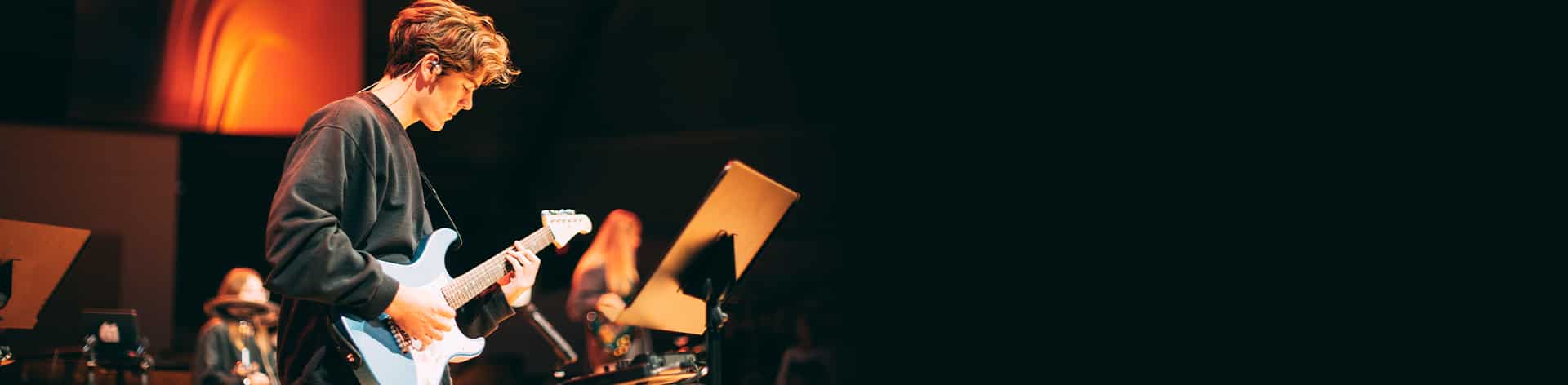 Cornerstone student leading worship