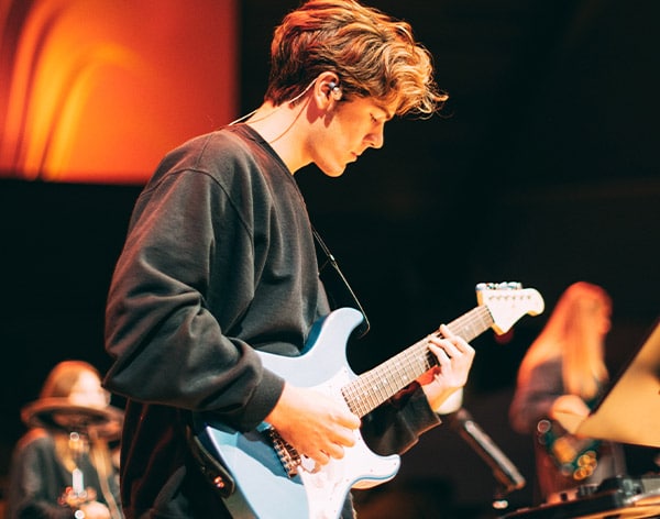 Cornerstone student leading worship