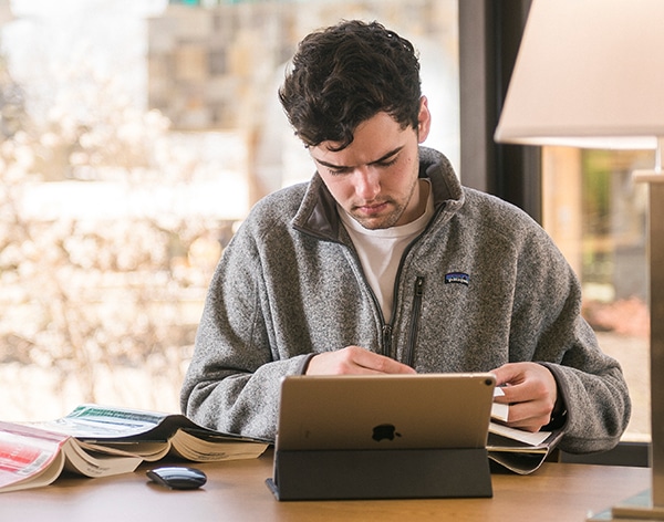 A student maximizes his degree in Interdisciplinary studies from Cornerstone University.