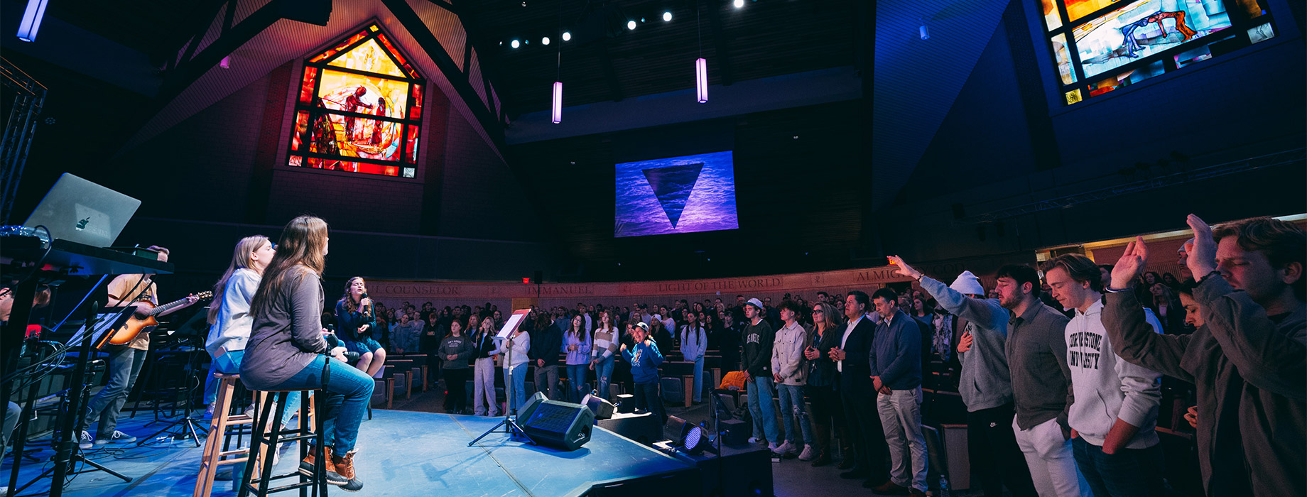Cornerstone Students worshipping during chapel