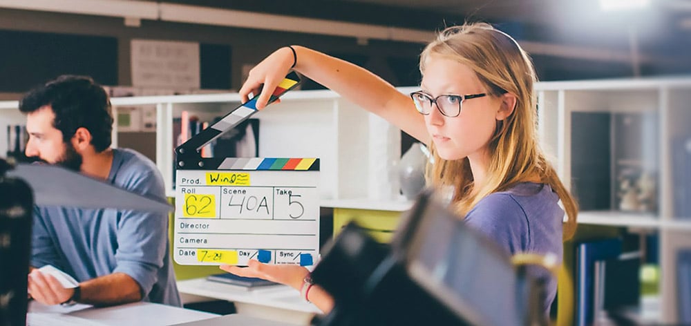Media production student on set to enhance her skills