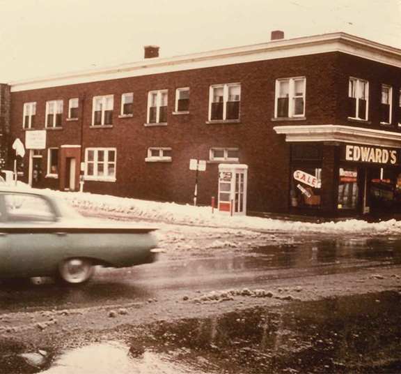 Classic car driving down a historic street in Grand Rapids, Michigan