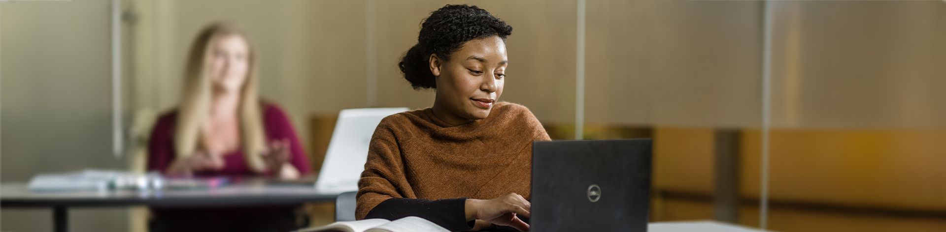 Cornerstone University student working on her computer