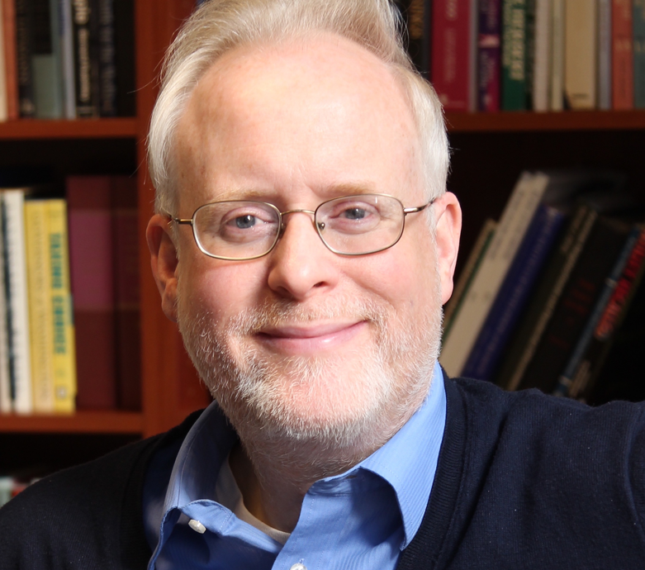 Dr. John G. West