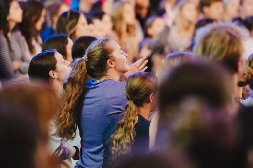 Students worshipping at Christ & Culture Week at Cornerstone University