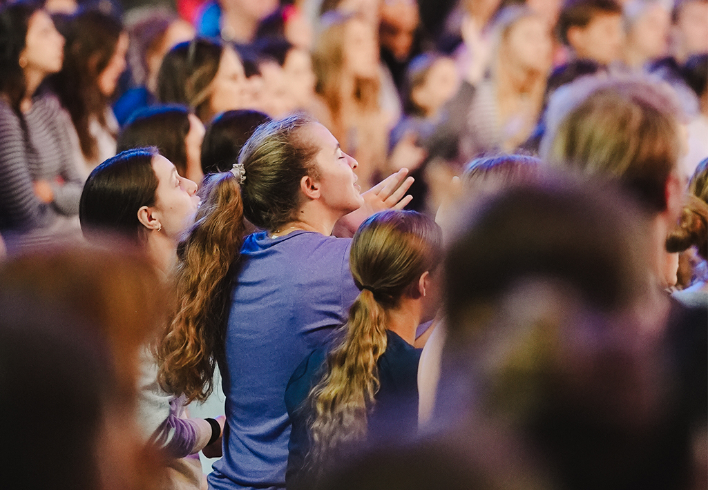 Students worshipping at Christ & Culture Week at Cornerstone University